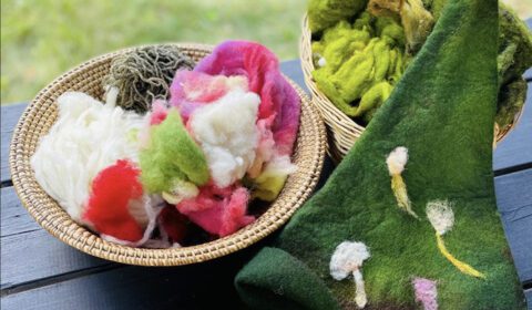 Felted sauna hat and wool materials used in workshop in Finland