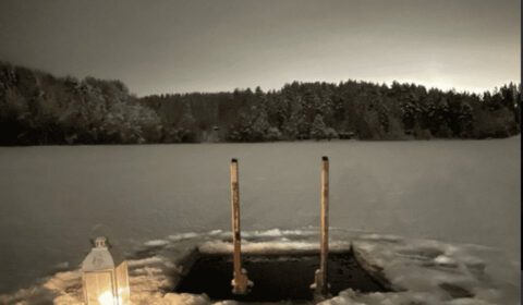 Ice swimming spot at Kivitasku in Muurame with frozen lake and lantern